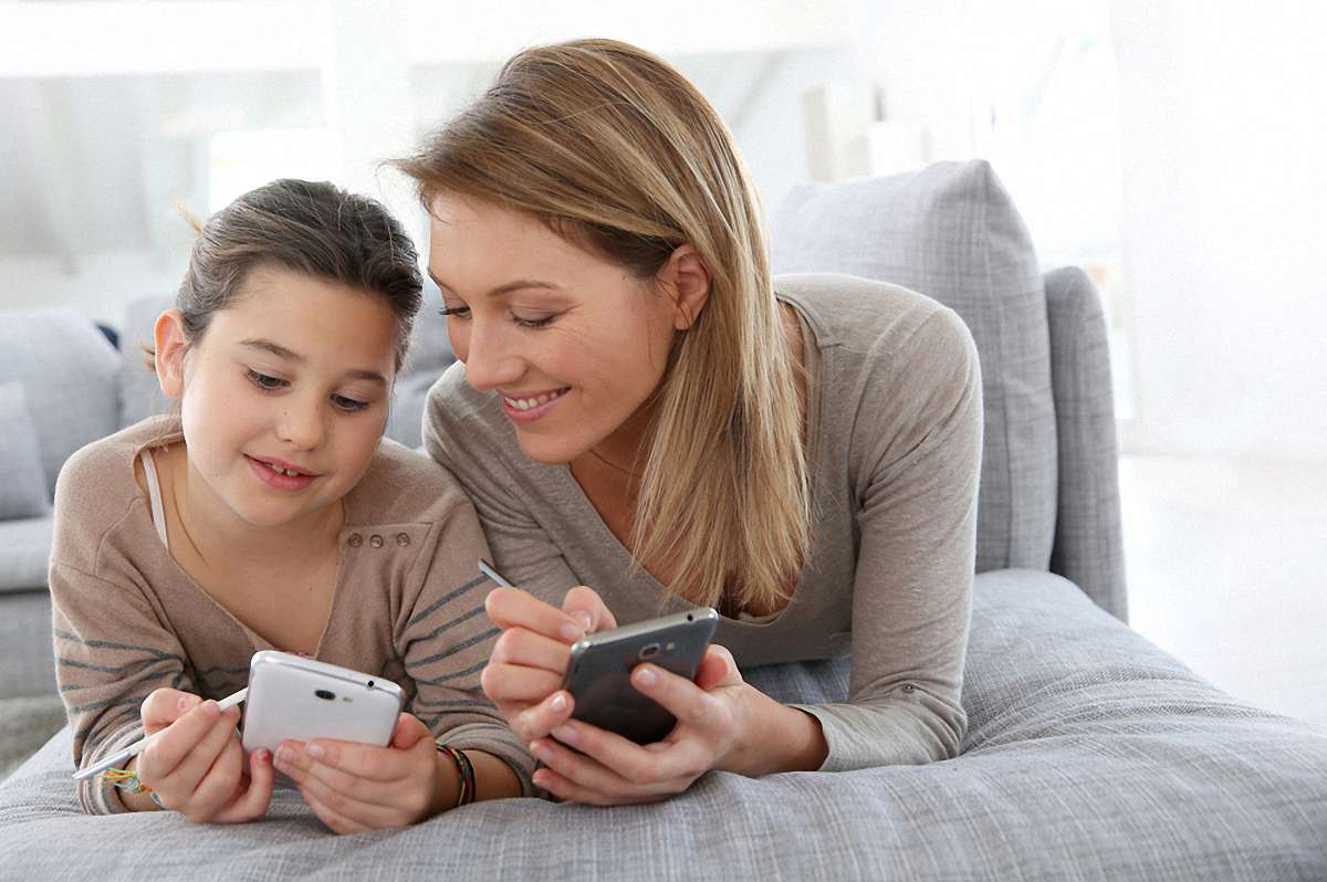 Mom and daughter with phones